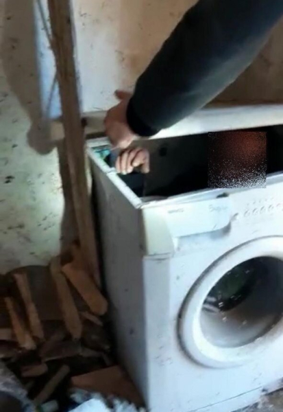 A 39-year-old man was on the run from the law. Police tracked him down by finding a human hand sticking out of a washing machine.