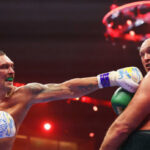 AI scored Usyk two points higher than real judges